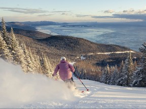 The St. Lawrence River is situated at the base of picturesque Le Massif de Charlevoix in Quebec.