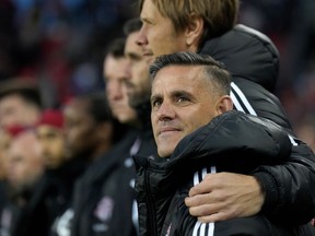 With the Florida half of training camp nearing a close, Toronto FC opens its pre-season schedule Friday with a game against Nashville SC. Toronto FC's incoming head coach John Herdman is embraced as they sing the national anthem prior to first half MLS soccer action against the Orlando City, in Toronto, Saturday, Oct. 21, 2023.