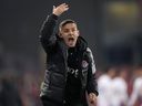 Toronto FC head coach John Herdman coaches his first game for the team from the sidelines during first half MLS soccer action against the Orlando City, in Toronto on October 21, 2023.