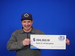 Ryan Gouveia of Hampton is pictured with his OLG cheque.