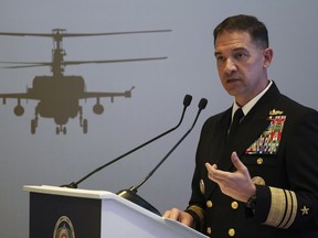 U.S. Navy Vice Adm. Brad Cooper, who heads the Navy's Bahrain-based 5th Fleet, speaks at an event at the International Defense Exhibition and Conference in Abu Dhabi, United Arab Emirates, Tuesday, Feb. 21, 2023.