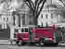 FILE - A firetruck is parked outside of the White House in Washington, Dec. 19, 2007. A fake 911 call that the White House was on fire sent emergency vehicles to the complex Monday morning. President Joe Biden and his family were at Camp David at the time.