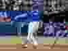 Toronto Blue Jays first baseman Vladimir Guerrero Jr. (27) watches the ball after hitting a two-run home run.