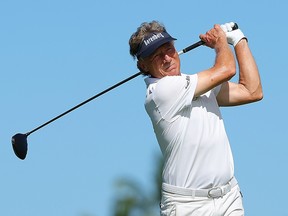 Bernhard Langer of Germany tees off the second hole during the first round of the Mitsubishi Electric Championship.