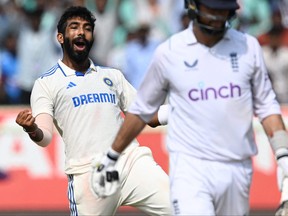 India's Jasprit Bumrah celebrates after taking the wicket of England's Ben Foakes.