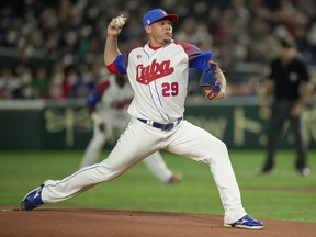 Yariel Rodriguez of Cuba pitches during the World Baseball Classic in 2023.