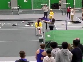 New Hampshire high school athlete Maelle Jacques wins a high jump event.