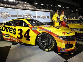 Joey Logano, driver of the #22 Shell Pennzoil Ford, (R) winner of the Daytona 500 pole award and Michael McDowell, driver of the #34 Love's Travel Stops Ford.