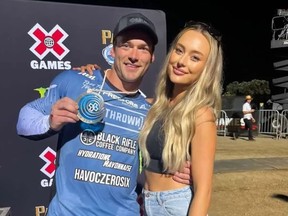 Motocross rider Jayo Archer poses with his fiancee, Beth King.