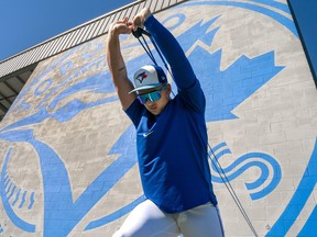 Toronto Blue Jays pitcher Ricky Tiedemann warms up during Spring Training.