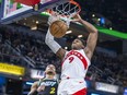 Toronto Raptors guard RJ Barrett dunks during the second half of an NBA basketball game against the Indiana Pacers.
