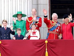 King Charles and Queen Camilla wave alongside Prince William, Prince of Wales, Prince Louis of Wales, Catherine, Princess of Wales and Prince George of Wales on the Buckingham Palace balcony during Trooping the Colour on June 17, 2023 in London, England. (Chris Jackson/Getty Images)