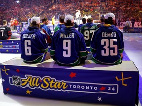 Brock Boeser, J.T. Miller and Thatcher Demko of the Vancouver Canucks take part in the all-star draft.