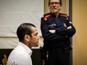 Brazilian footballer Dani Alves looks on at the start of his trial at the High Court of Justice of Catalonia in Barcelona, on February 5, 2024.