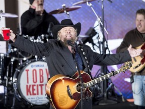 Country singer Toby Keith performs for US President-elect Donald Trump and his family during a welcome celebration at the Lincoln Memorial in Washington, DC, on January 19, 2017. (Photo by BRENDAN SMIALOWSKI/AFP via Getty Images)