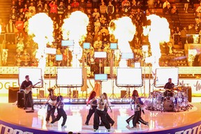 Singer, songwriter and dancer Tate McRae performs prior to the game between Team Matthews and Team McDavid during the NHL all-star game on Feb. 3, 2024 in Toronto. COLE BURSTON/GETTY IMAGES