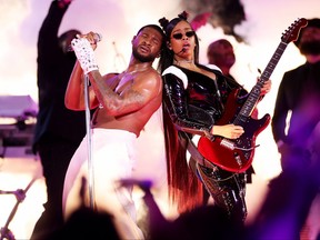 Usher and H.E.R. perform.