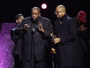 Killer Mike, left, and DJ Paul accepts the award for best rap performance for "Scientists & Engineers" during the 66th annual Grammy Awards on Sunday, Feb. 4, 2024, in Los Angeles.