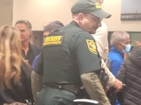 Toronto resident Nicholas Bello shared this photo of local police to social media while his flight from Ft. Lauderdale was delayed earlier this week.