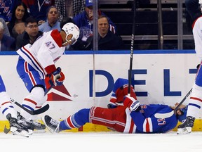 Blake Wheeler of the New York Rangers is injured during the first period on a check by Jayden Struble of the Montreal Canadiens at Madison Square Garden on Feb. 15, 2024 in New York City.