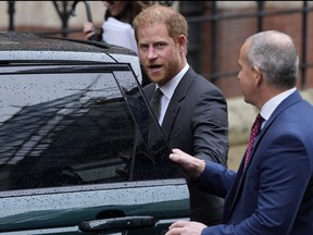 Prince Harry leaves the Royal Courts Of Justice in London, Tuesday, March 28, 2023. (AP Photo/Alastair Grant, File)