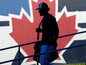 Toronto Blue Jays Santiago Espinal walks between fields during Spring Training action in Dunedin, Fla. on Wednesday, February 21, 2024. THE CANADIAN a/Frank Gunn