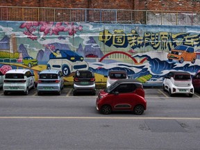 The photo taken on Jan. 24, 2024, shows mini electric vehicles in Liuzhou, in southern China's Guangxi province.