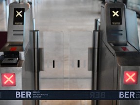 A closed gate entry is pictured at the Berlin Brandenburg airport (BER) in Schoenefeld on Feb. 1, 2024, during a nationwide strike of airport security staff.