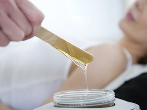 Hot wax used in hair removal is pictured in this file photo.