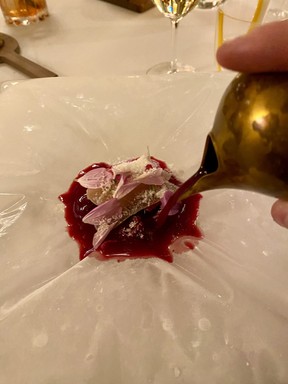An ice pillow adds to the presentation for a dish at two Michelin-starred Restaurant Le Meurice Alain Ducasse.