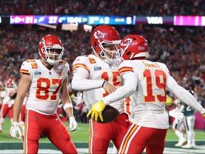 Kadarius Toney, right, of the Kansas City Chiefs celebrates with Patrick Mahomes, centre of the Kansas City Chiefs after a five yard touchdown reception against the Philadelphia Eagles during the fourth quarter in Super Bowl LVII at State Farm Stadium on Feb. 12, 2023 in Glendale, Ariz.