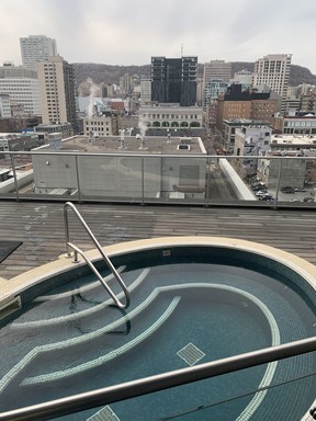 View from the all-season hot tub on the 12th floor of Warwick Le Crystal in downtown Montreal.