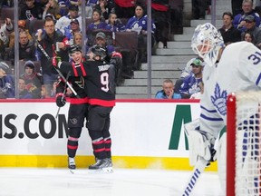 Senators forwards Vladimir Tarasenko and Shane Pinto celebrate a goal on Leafs goalie Martin Jones on Saturday.