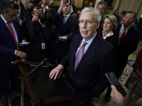 U.S. Senate Minority Leader Mitch McConnell talks to reporters following the weekly Senate Republican caucus policy luncheon at the U.S. Capitol in Washington, D.C., Tuesday, Feb. 27, 2024.