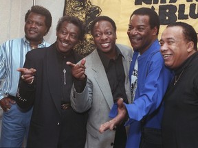 The Spinners from left; John Edwards, Bobby Smith, Henry Fambrough, Pervis Jackson and Billy Henderson pose for photographers during a Rhythm & Blues Foundation news conference in New York, Feb. 27, 1997.