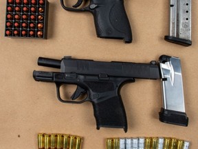 Peel Regional Police seized firearms and ammunition on Tuesday. A Brampton man and Toronto woman are facing numerous charges.