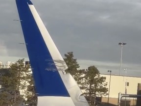 This image provided by Brian O'Neil shows a damaged plane's wingtip after two JetBlue planes made contact in a minor collision at Boston Logan International Airport on Thursday, Feb. 8, 2024 in Boston.