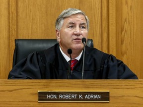 Judge Robert Adrian presides over court