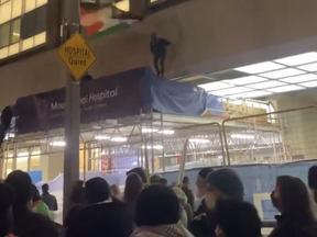 A screenshot from video posted to X of protesters outside Mount Sinai Hospital in Toronto on Monday, Feb. 12, 2024.