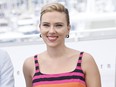Scarlett Johansson poses for photographers at the photo call for the film "Asteroid City" at the 76th international film festival in Cannes, southern France, May 24, 2023.