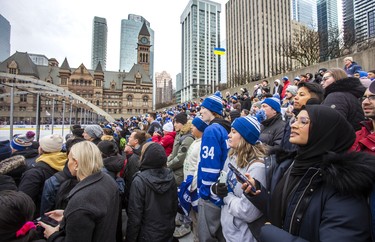 Fans watch the Toronto Maple Leafs.