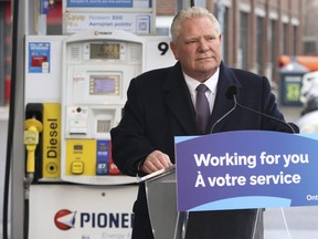 Ontario Premier Doug Ford at a Pioneer gas station in Mississauga's Port Credit area speaking about carbon pricing programs and eliminating vehicle registrations in Ontario on February 13, 2024.