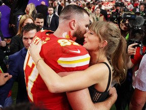 Chiefs wide receiver Travis Kelce and Taylor Swift embrace after his team defeated the 49ers in overtime during Super Bowl LVIII at Allegiant Stadium in Las Vegas, Feb. 11, 2024.