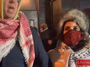 Pro-Palestinian protesters block the entrance to Yuk Yuk's Comedy Club
