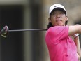 Anthony Kim watches his tee shot on the fourth hole during the final round of the Greenbrier Classic PGA golf tournament at the Greenbrier in White Sulphur Springs, W. Va., July 31, 2011.