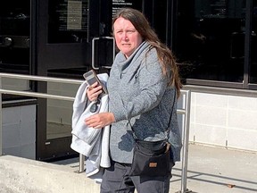 Veronica Whittal, a 48-year-old Tilbury woman facing a fraud charge in connection to funds missing from the United Way of Chatham-Kent, leaves Chatham court on Monday following her first appearance on the charge. (Ellwood Shreve/Postmedia Network)