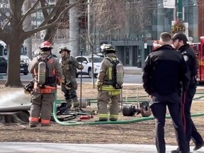 Toronto Fire crews put out the flames after an explosion at a homeless encampment in Clarence Square Park near Spadina Ave. and Front St. on Thursday, Feb. 29, 2024.