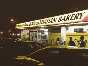 Customers outside of Commisso Bros. & Racco Italian Bakery in Toronto.