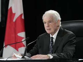 Justice Paul Rouleau releases his report on the Liberal government's use of the Emergencies Act, in Ottawa, Friday, Feb.17, 2023. The Liberal government has missed its deadline to respond to the findings and recommendations of Justice Rouleau, who headed a federal inquiry into the government's first and only use of the Emergencies Act in 2022.