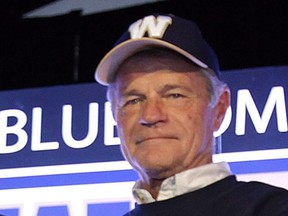 The Winnipeg Blue Bombers alumni Ken Ploen takes part in a press conference in Winnipeg, Tuesday, April 24, 2012. Ken Ploen, a two-way star who led the Winnipeg Blue Bombers to four Grey Cup titles, has died at 88.